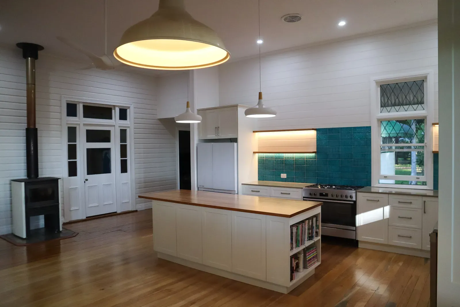 Wide view across the open-plan kitchen and living space